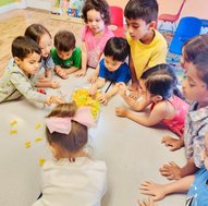 Toddlers engaging in hands-on learning at Level Up Montessori, building confidence through play and routines.