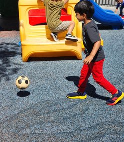 Children playing outside at Level Up Montessori after-school program.