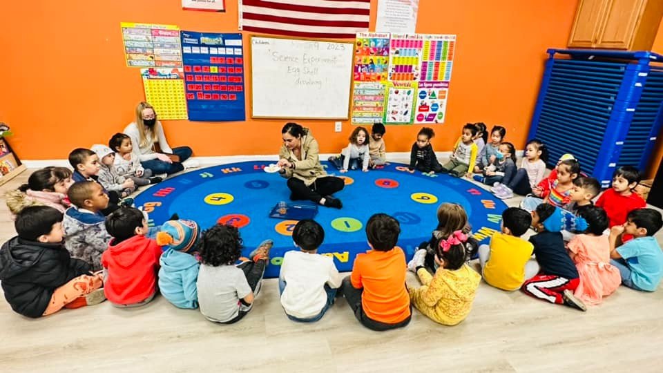 Montessori students in a circle during a classroom activity focused on learning at Level Up Montessori.