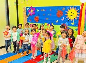 Children at Level Up Montessori participating in spring-themed activities for kindergarten readiness.