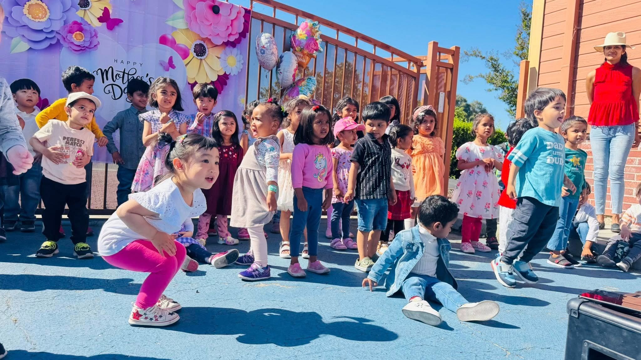 Children engaged in hands-on learning at Level Up Montessori's outdoor preschool program.