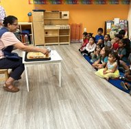 Teacher engaging children in a Montessori classroom at Level Up Montessori, Bay Area.