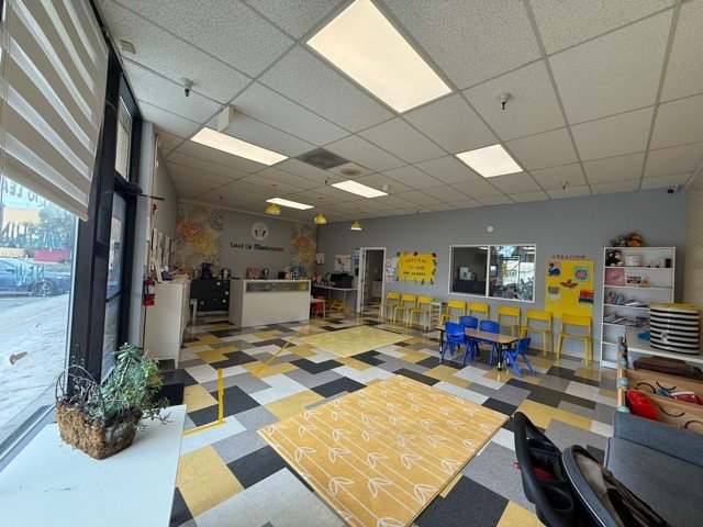 Children engaged in educational activities at Level Up Montessori Bay Area classroom.