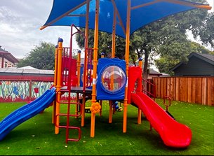 Colorful playground equipment at Level Up Montessori in Bay Area for children 12 months to 6 years.