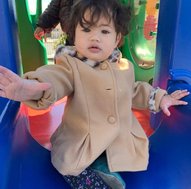 Infant enjoying playtime at Level Up Montessori, highlighting nurturing and child-focused care.